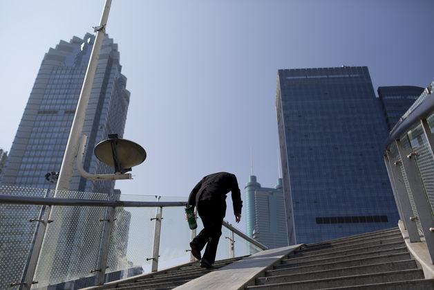 Asian stocks, Oil retreat on China data; gold gains