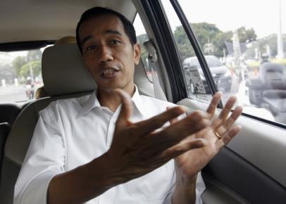 Indonesia's Jokowi pledges to eliminate fuel subsidies slowl
