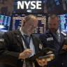 Wall St Ends at Records on Central Bank Action