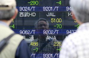 Oil Down, Stocks Mixed as Japan Slips into Recession