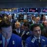 Wall St Gains on Earnings, Data; Conflicts Still Eyed